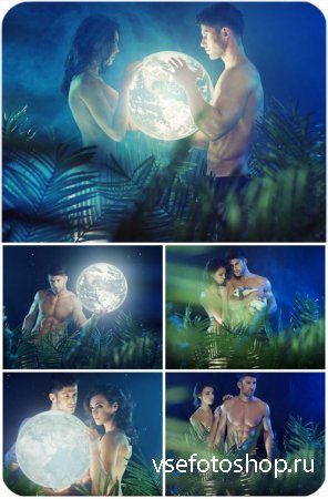       / Romantic couple with the moon in hands - Stock Photo