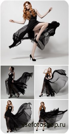      / Girl in a long black dress - Stock Photo