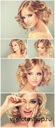 Pretty blonde girl with hairstyle curled hair