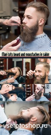 Man cuts beard and moustaches in salon