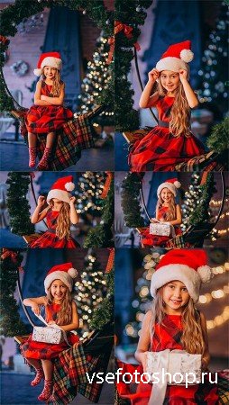     -   / Girl at the Christmas tree  ...
